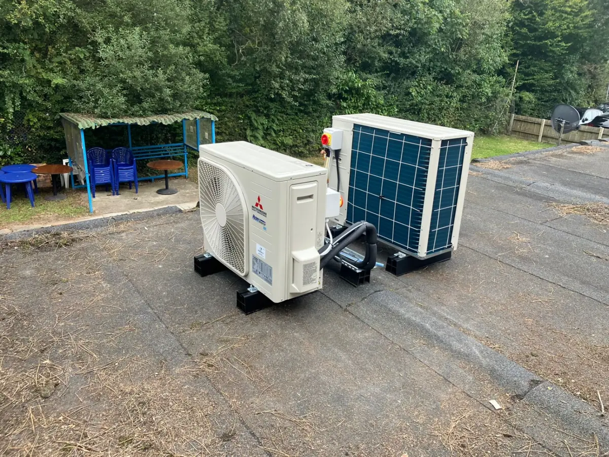 Rooftop Mitsubishi condenser units installation