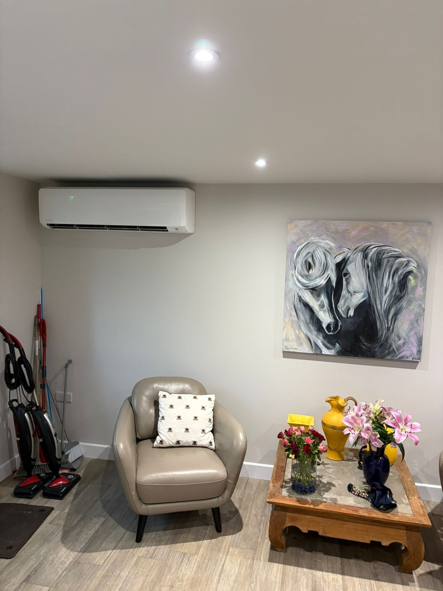 Wall-mounted AC unit in stylish living room