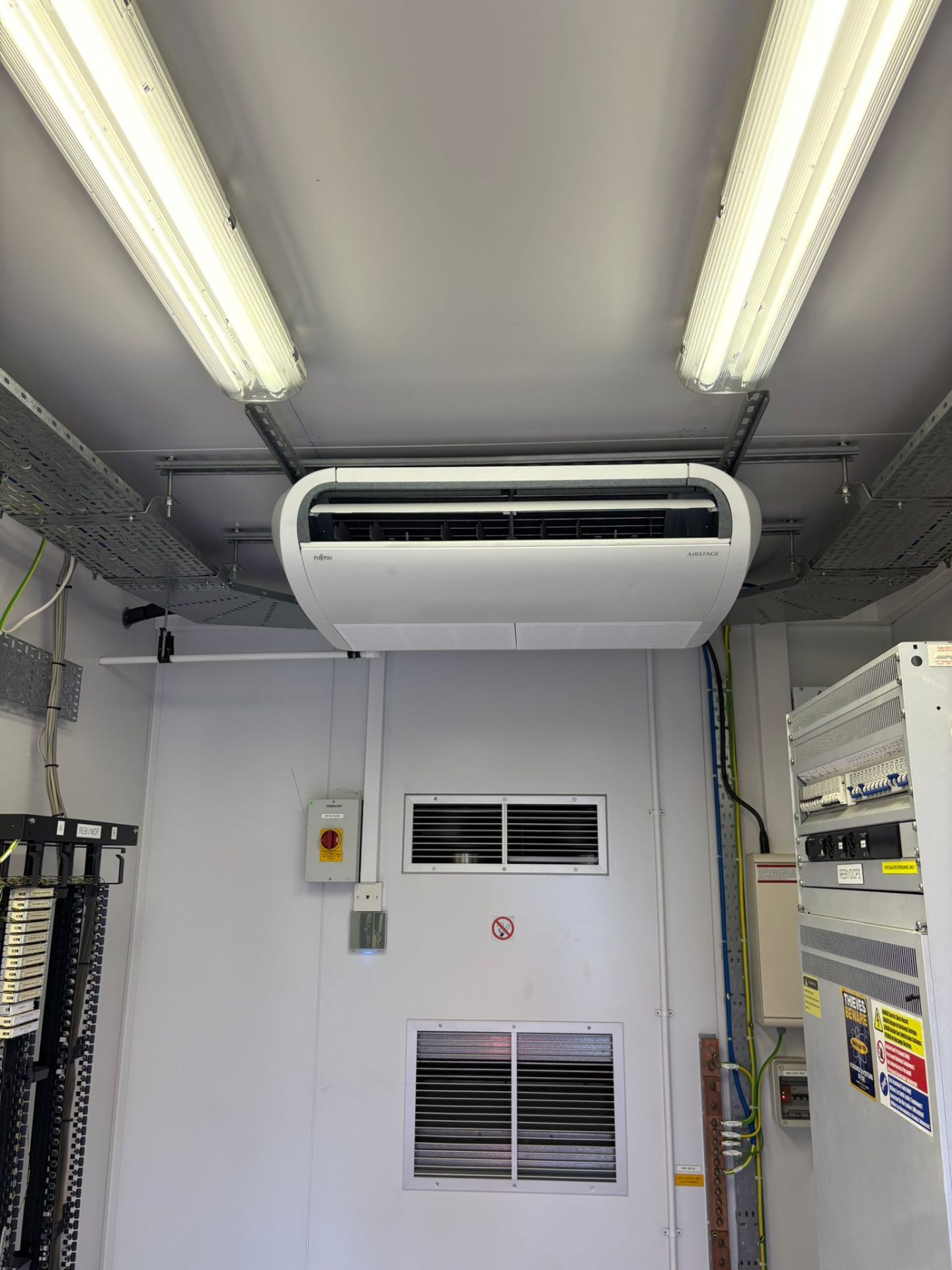 Fujitsu ceiling-mounted AC in server room
