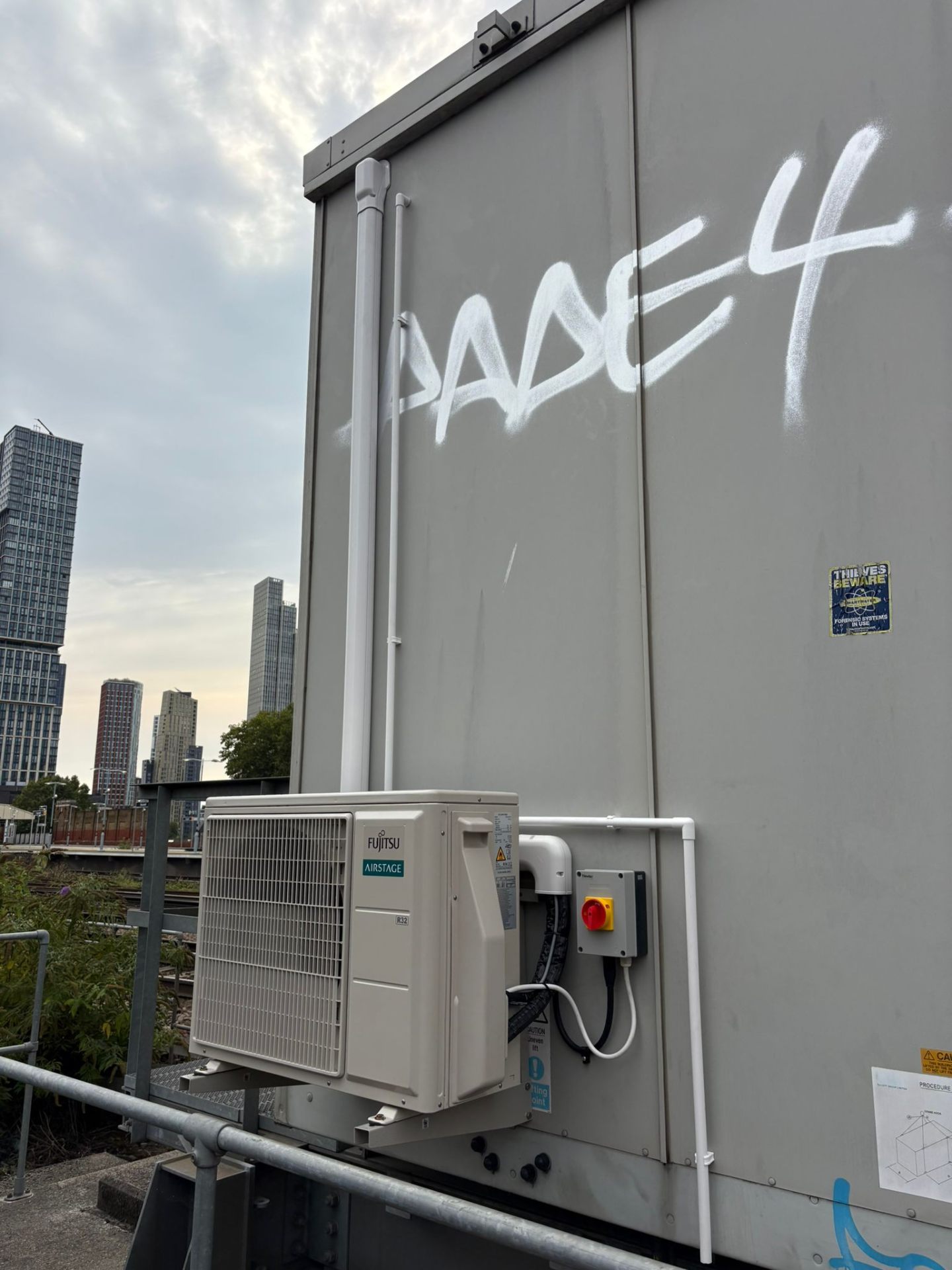 Fujitsu Airstage outdoor unit on rooftop in London